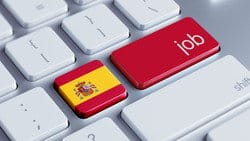 コンピューターのキーボードにあるスペインの国旗。