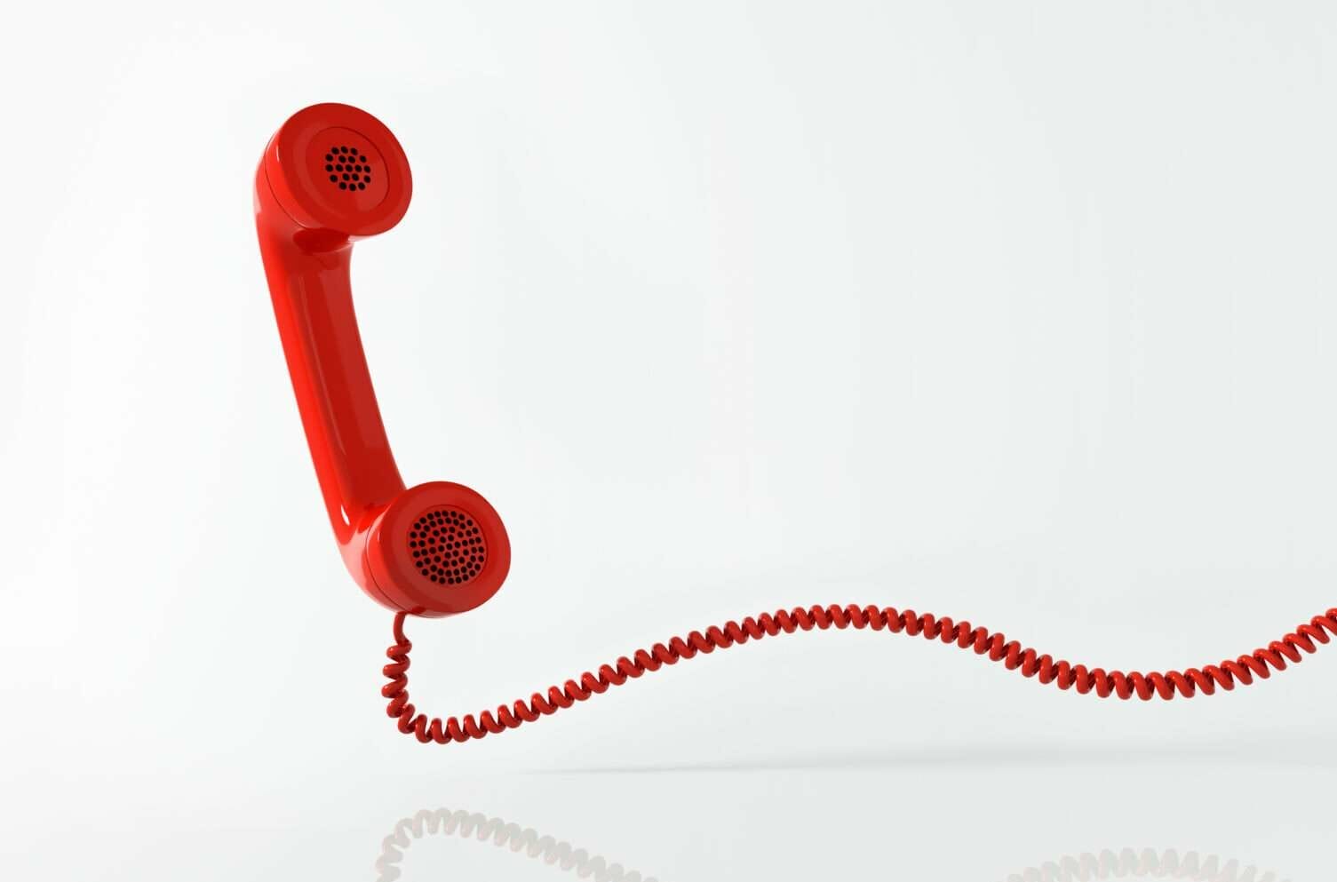 スペインの白地に赤い電話。 スペインの白地に赤い電話。