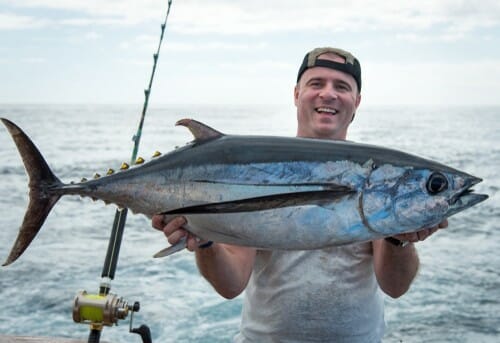 Happy,Angler,Holding,Big,Tuna,Fish